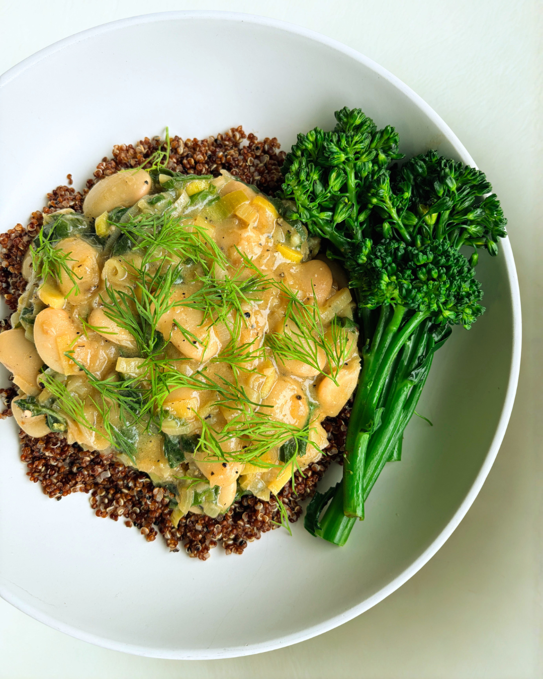 CREAMY MISO BEANS With leeks, lemon, spinach on Red Quinoa with Brocollini